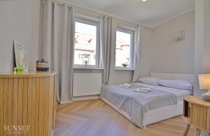 Sunset Apartments - Słoneczne dwa pokoje, kolej UBB, kawiarnie, restauracje, trasy rowerowe