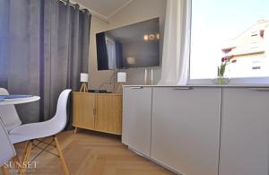 Sunset Apartments - Słoneczne dwa pokoje, kolej UBB, kawiarnie, restauracje, trasy rowerowe