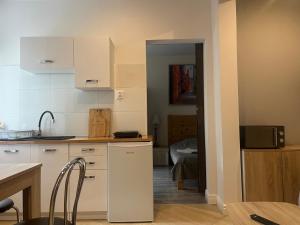 Leonia- Apartamenty i Pokoje Gościnne
