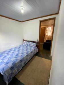 Casa aconchegante com dois quartos mais área externa
