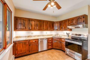 Waterfront home with scenic porches, yard, grill, jetted tub, central AC, & WD