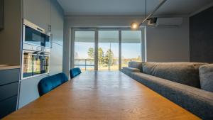 Apartament Bassotto nad jeziorem Białym
