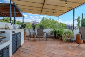 Lovely condo with rooftop deck in gated community