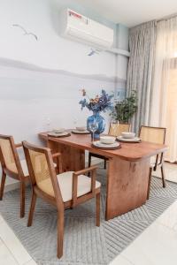 Sandy Shore Beach Apartments - Karibu Quarters