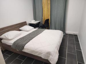 Appartement T4 au RDC dun immeuble