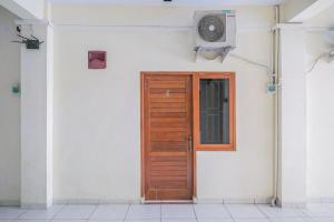 Maharani Guest House RedPartner at Gatot Subroto Timur Denpasar