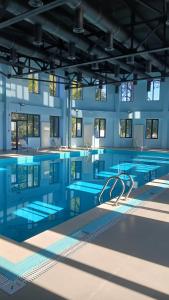 Апартаменты на первой линии с SPA бесплатным бассеином и тренажерным залом
