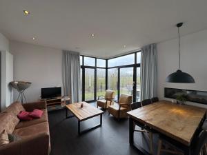 EuroParcs Bad Meersee Chalet Küstenzeit mit Zaun Haus Nr 97