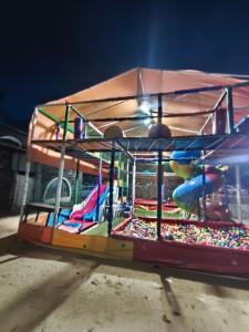 House with Pool in front of the Potengi River