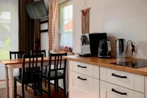 Holiday cottages by the sea in an oasis of peace