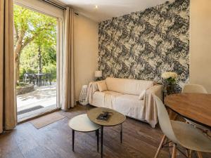 A CASA CORBAIA Appartement 40 m2, jardin privé, parking, proche centre ville et mer Apartment 40 m2, private garden parking near town center and sea port and airport