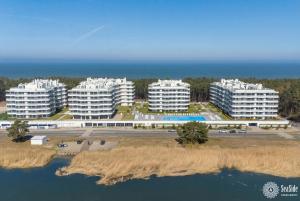 Rogowo PEARL Seaside Apartamenty - prywatne zejście na plażę, basen zewnętrzny, fitness, bawialnia dla dzieci, konsole PlayStation 5, prywatny parking w hali garażowej