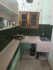 Air Conditioned studio room with complete kitchen