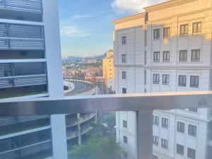 Warm-toned 2 Bed studio Condotel at Newport City Across NAIA Terminal 3