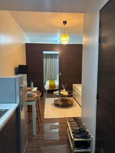 Air Residences Makati 1BR Hall and Balcony