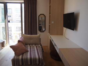 Modern 1BR in Award-Winning Residence with Sauna and Gym