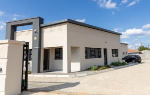 Premium Resort Group trading as Premium Resort Guesthouse