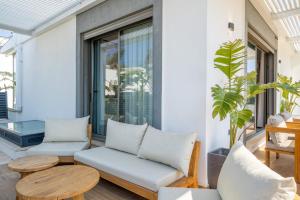 MAVIIE Luxusvilla mit Pool & Meerblick in Yalıkavak Geris