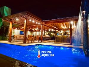 Recanto Quinta das Palmeiras, Casa com Piscina Aquecida, até 16 pessoas, Perto dos Parques, Olímpia-SP