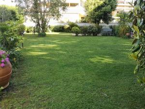 Casa con giardino