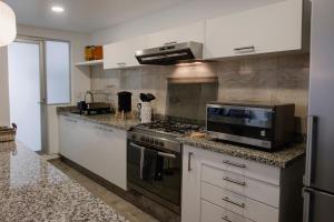 Designer apartment with terrace in Roma Sur