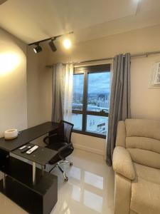 Condo JTower nearAirport Fbr300mbps