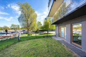 Przestronny Apartament z Ogrodem by Noclegi Renters