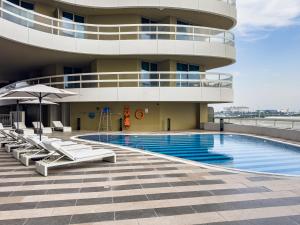 Coastal Retreat - 1BR - Beach access - Saadiyat - Near Zayed Museum, Louvre, Cultural District