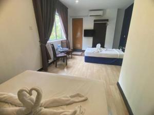 Get Inn Hotel at 1 Capital Holdings