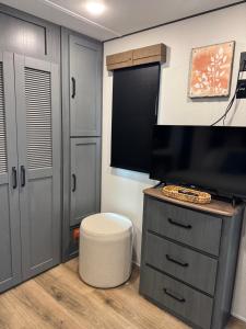 Extra large 4 bedroom with two full bath glamping rv with golf cart
