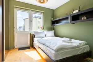Łańcucka Homely Apartment by BookingHost