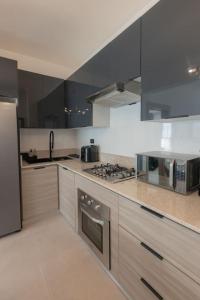 2BR Love Nest, Jacuzzi, Gym, 1 Free Excursion