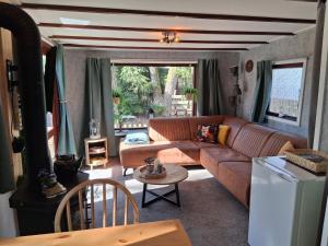 Chalet Vuurvos - sfeervol chalet met omheinde tuin, midden in de bossen van Drenthe