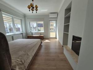 Apartamentai prie parko