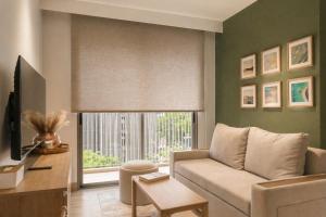 Family 2BR in Laguna Golf View Skypark Pool