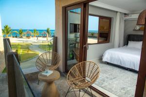 Sandy Shore Beach Apartments - Karibu Quarters