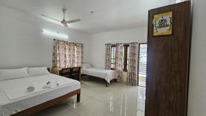 PAZHOOR RESIDENCY HOME Stay