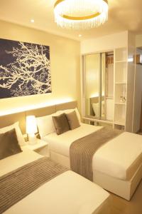 Stay near Mall of Asia, MOA Arena, SMX PICC & NAIA - Adie Suite