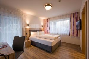 Four-Bedroom Apartment (Hochzillertal) room in Aparthotel AlpTirol