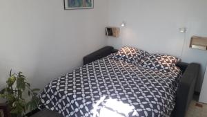 Un balcon sur la Cité médiévale, appartement cosy et lumineux