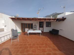 Susa and Pepe garden and house