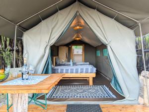 Camp Naledi - Exclusive Safari Tented Lodge with River View I Full Board I Natural Plunge Pools I Free WiFi