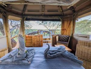 Camp Naledi - Exclusive Safari Tented Lodge with River View I Full Board I Natural Plunge Pools I Free WiFi