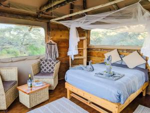 Camp Naledi - Exclusive Safari Tented Lodge with River View I Full Board I Natural Plunge Pools I Free WiFi