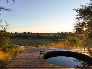 Camp Naledi - Exclusive Safari Tented Lodge with River View I Full Board I Natural Plunge Pools I Free WiFi