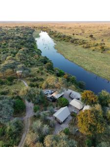 Camp Naledi - Exclusive Safari Tented Lodge with River View I Full Board I Natural Plunge Pools I Free WiFi