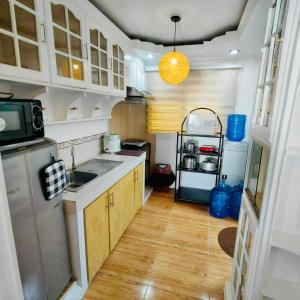 Condo one oasis 2 bedrooms with parking - near SM Ecoland