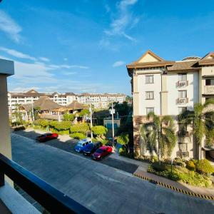 Condo one oasis 2 bedrooms with parking - near SM Ecoland