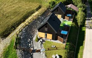 Projekt ŚWIT - domki z prywatną jacuzzi i sauną
