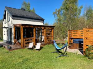 Dębowy Zakątek Sasino - domki z sauną lub jacuzzi